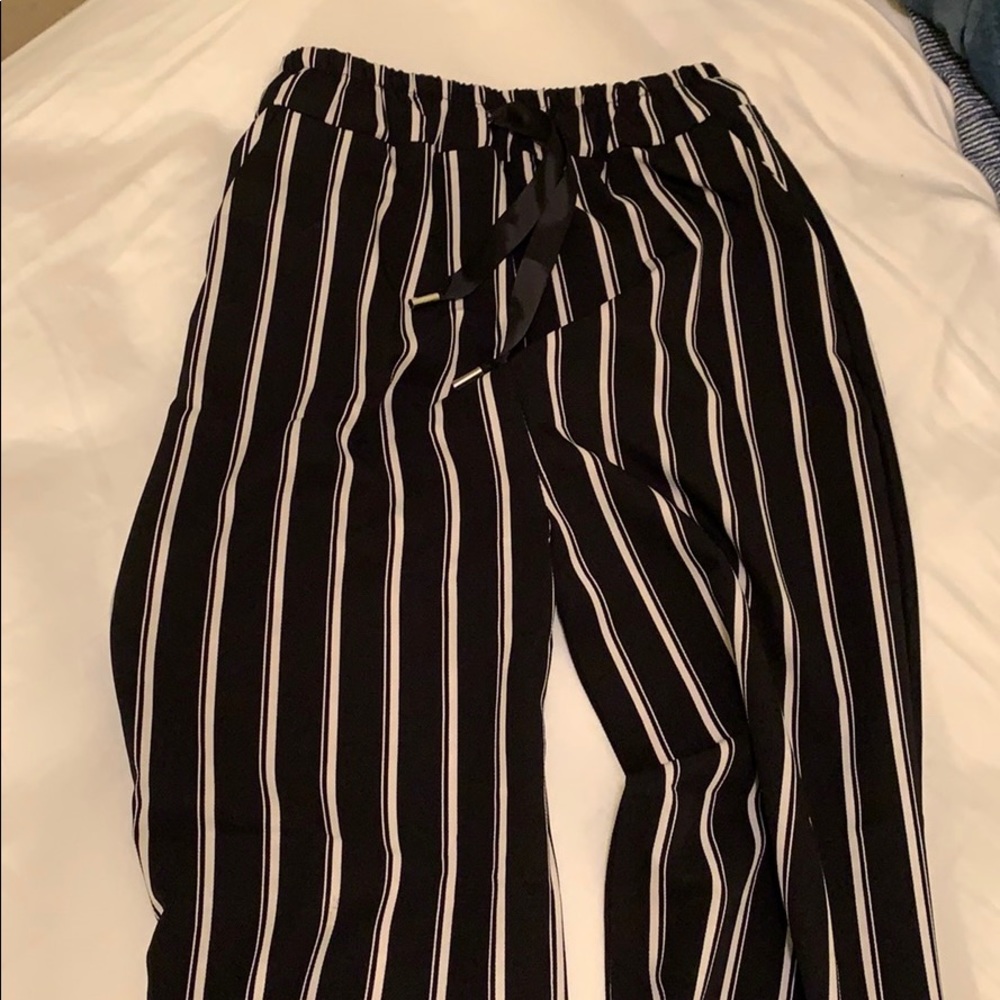 Black and white striped pants
